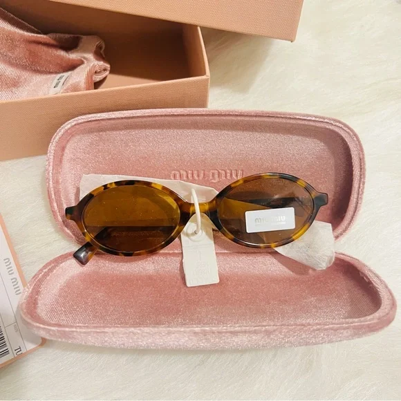 Miu Miu Regard Oval Sunglasses - Picture 2 of 5